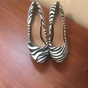 Zebra print textured heels.